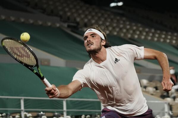 The Latest Tsitsipas beats Medvedev to reach French Open SF AP News